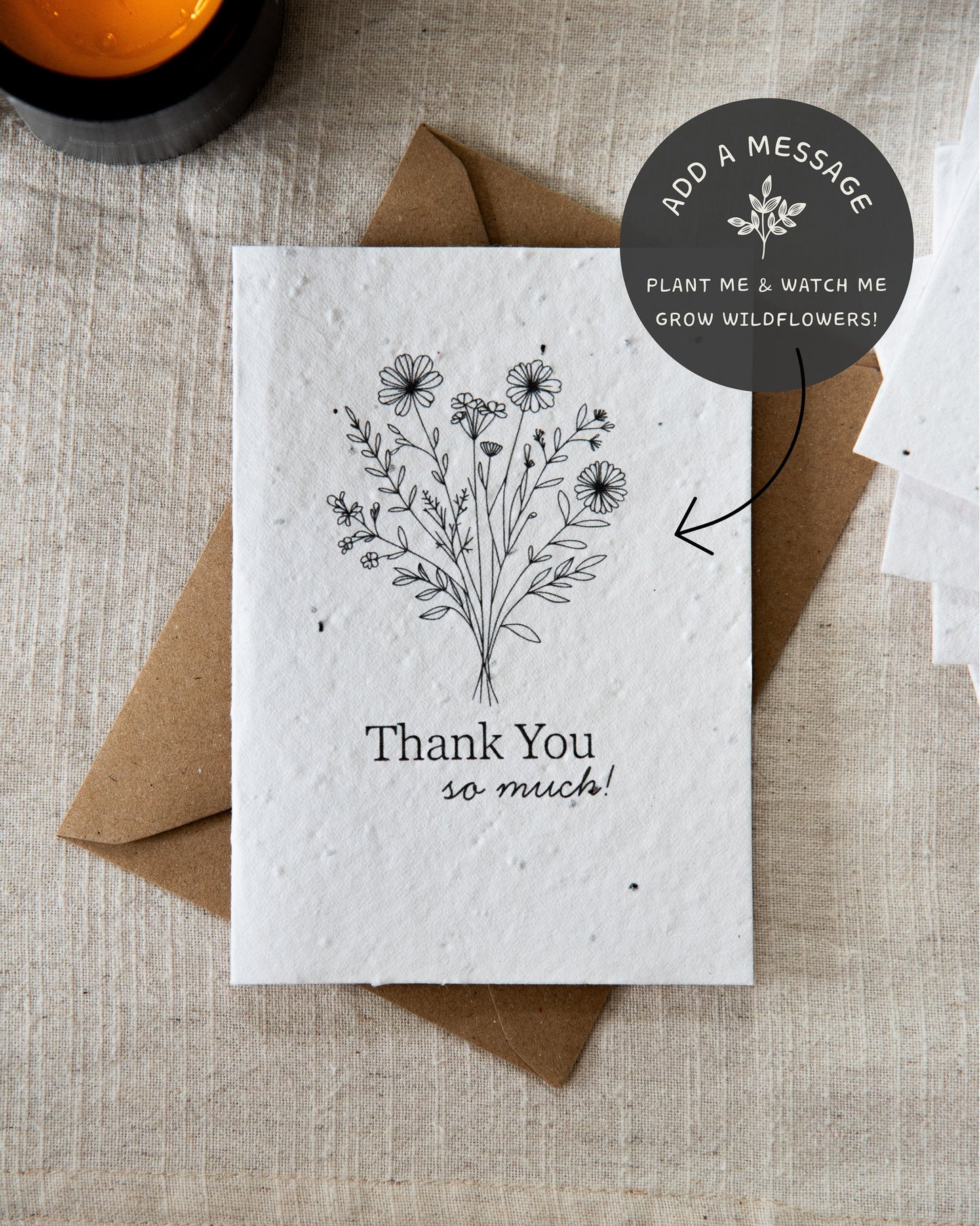 plantable wildflower seed card with the message 'thank you so much'. Handmade with botanical image on the font and blank inside. Complete with a C6 Kraft Envelope.