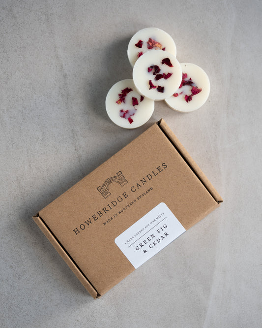 Howebridge Candles botanical soy wax melts, sprinkled with dried rose petals. Featuring a wax melt kraft box stamped with their logo and with a scent descriptive label.