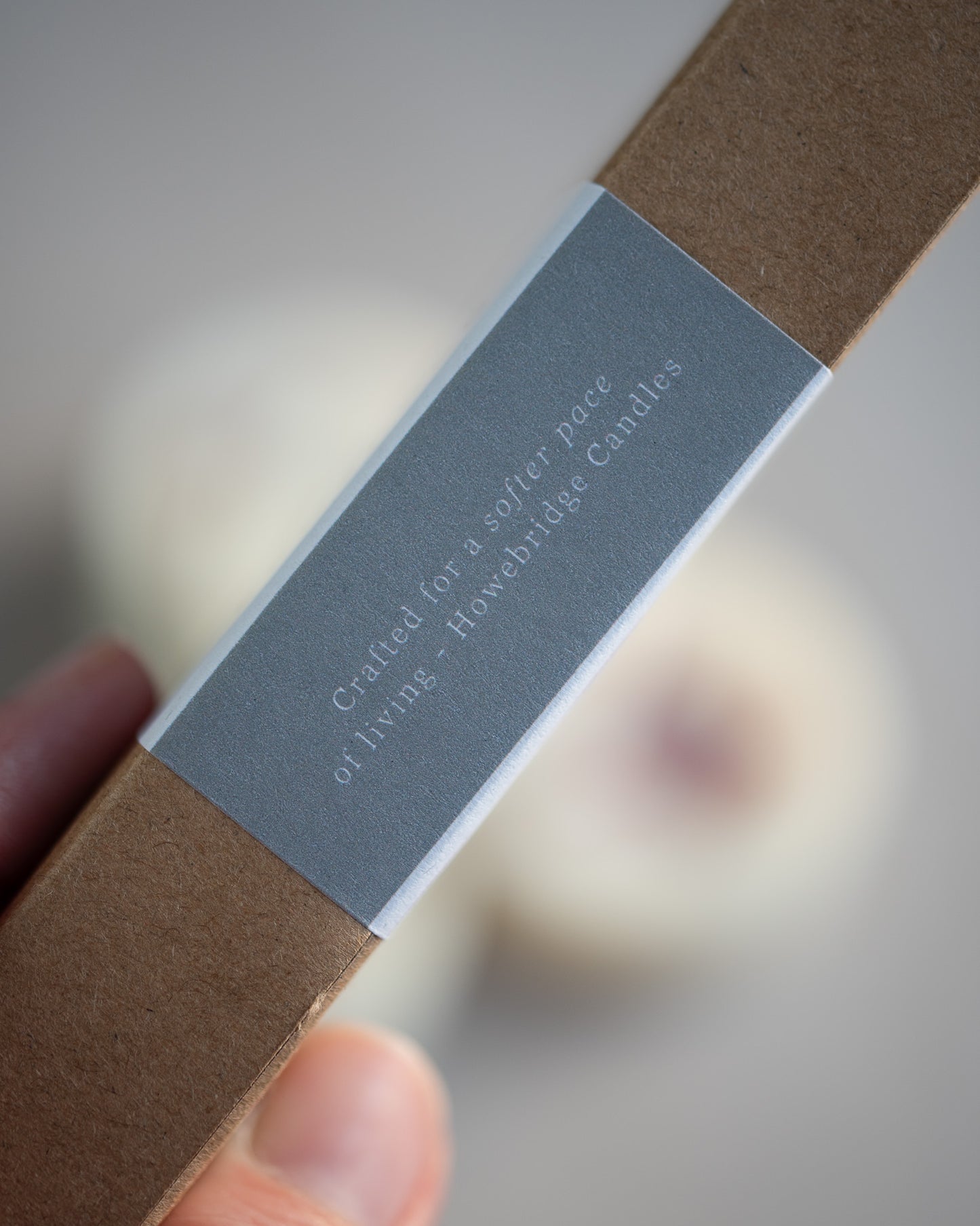 Howebridge Candles botanical soy wax melt box, featured writing on the side that says 'crafted for a softer pace of living'.