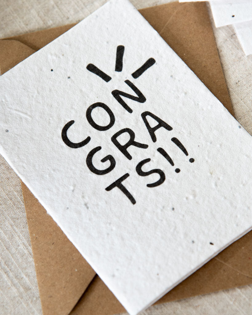 Wildflower plantable seed card with the message 'congrats'. Printed on cotton paper, sustainably made and complete with c6 kraft envelope. Personalise for the ultimate celebratory gift.