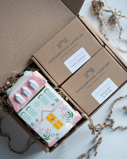 Howebridge Candles soy wax melt starter kit, featuring pastel house burning and 2 boxes of botanical soy wax melts.